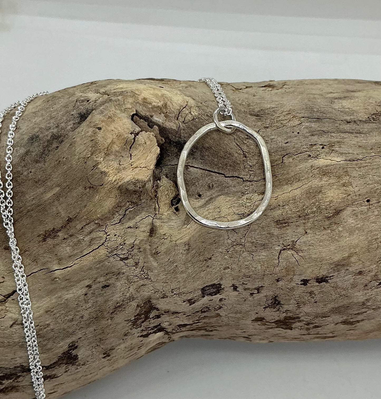 Hammered oval pendant