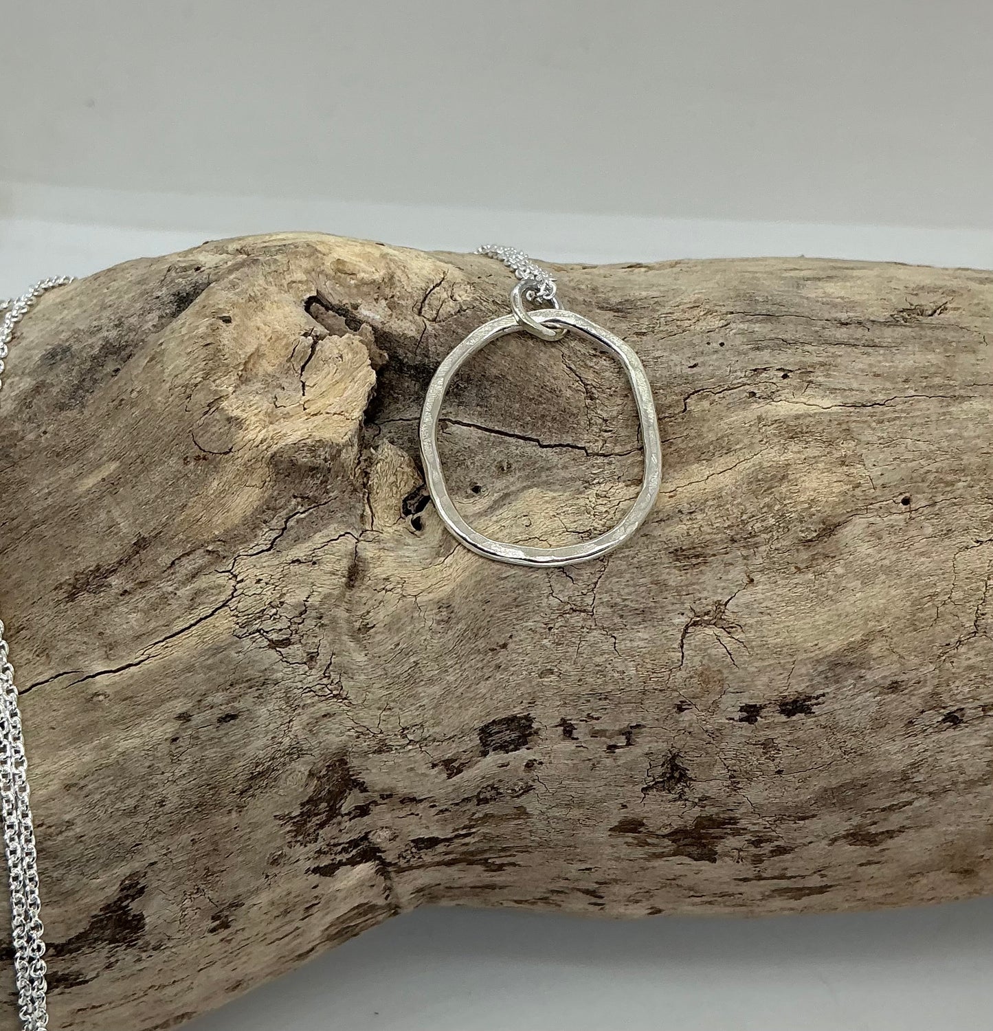 Hammered oval pendant
