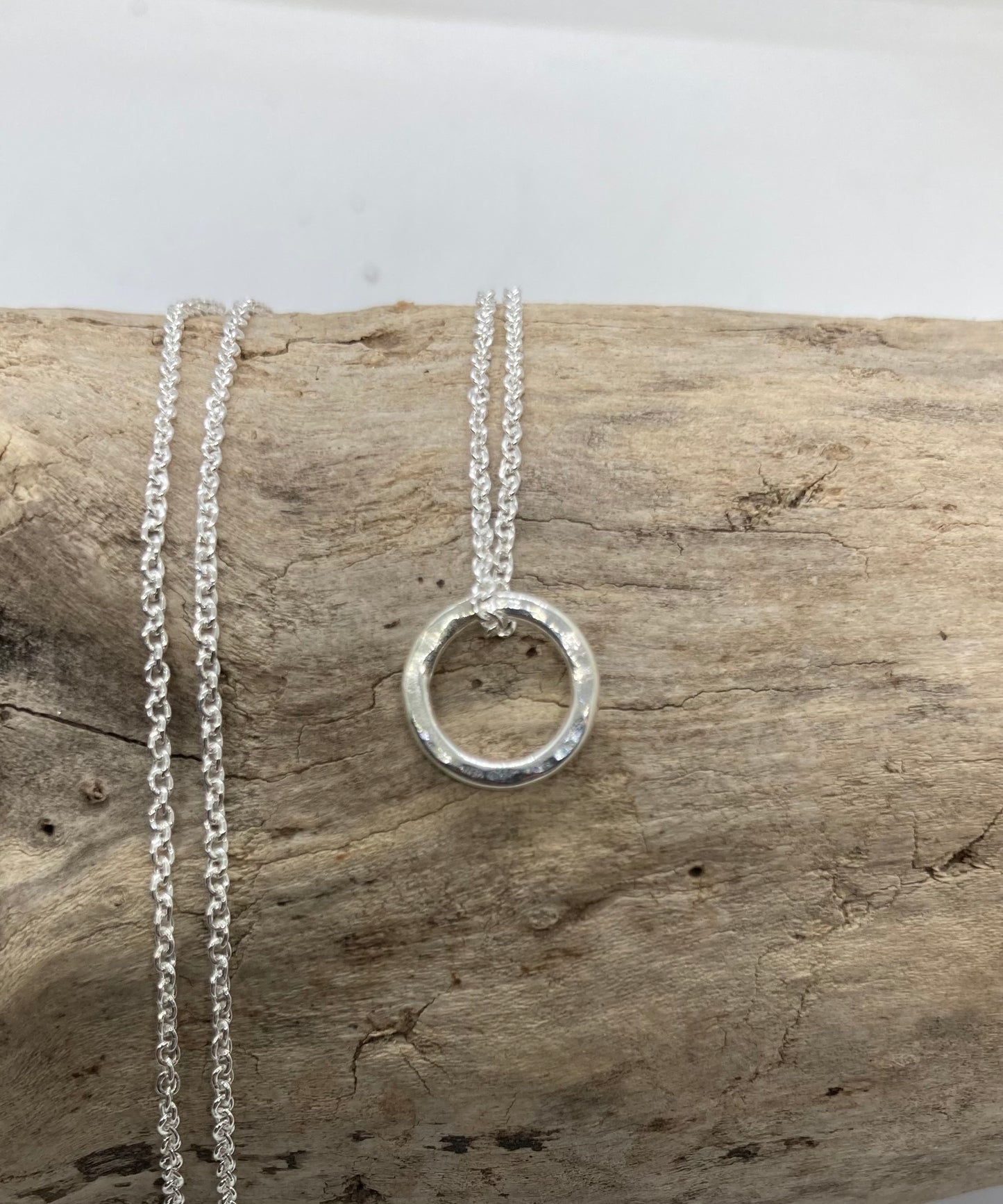 Open circle sterling silver pendant