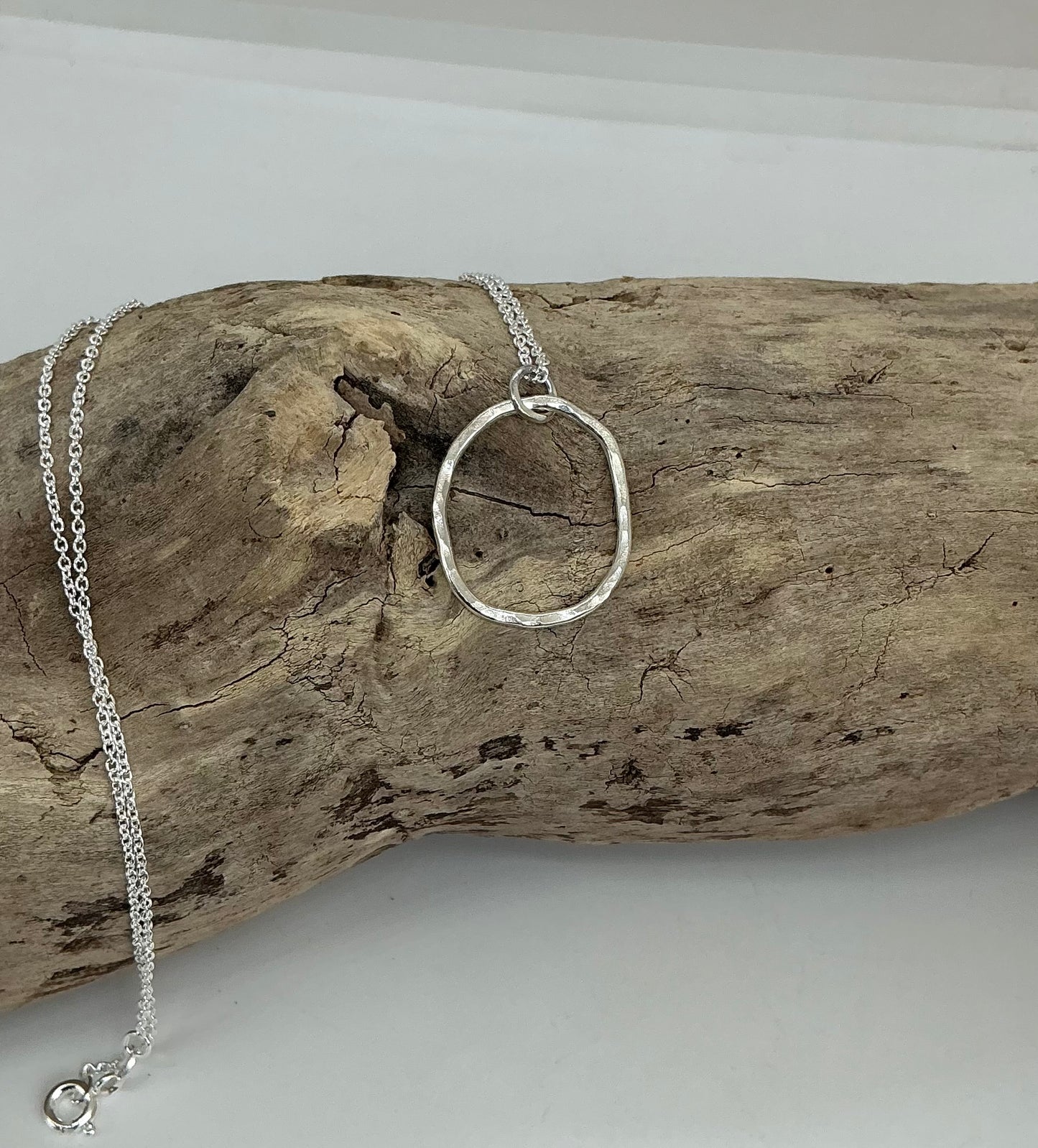 Hammered oval pendant