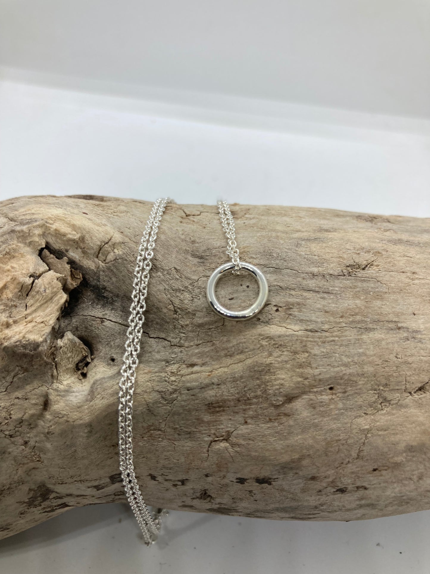 Open circle sterling silver pendant