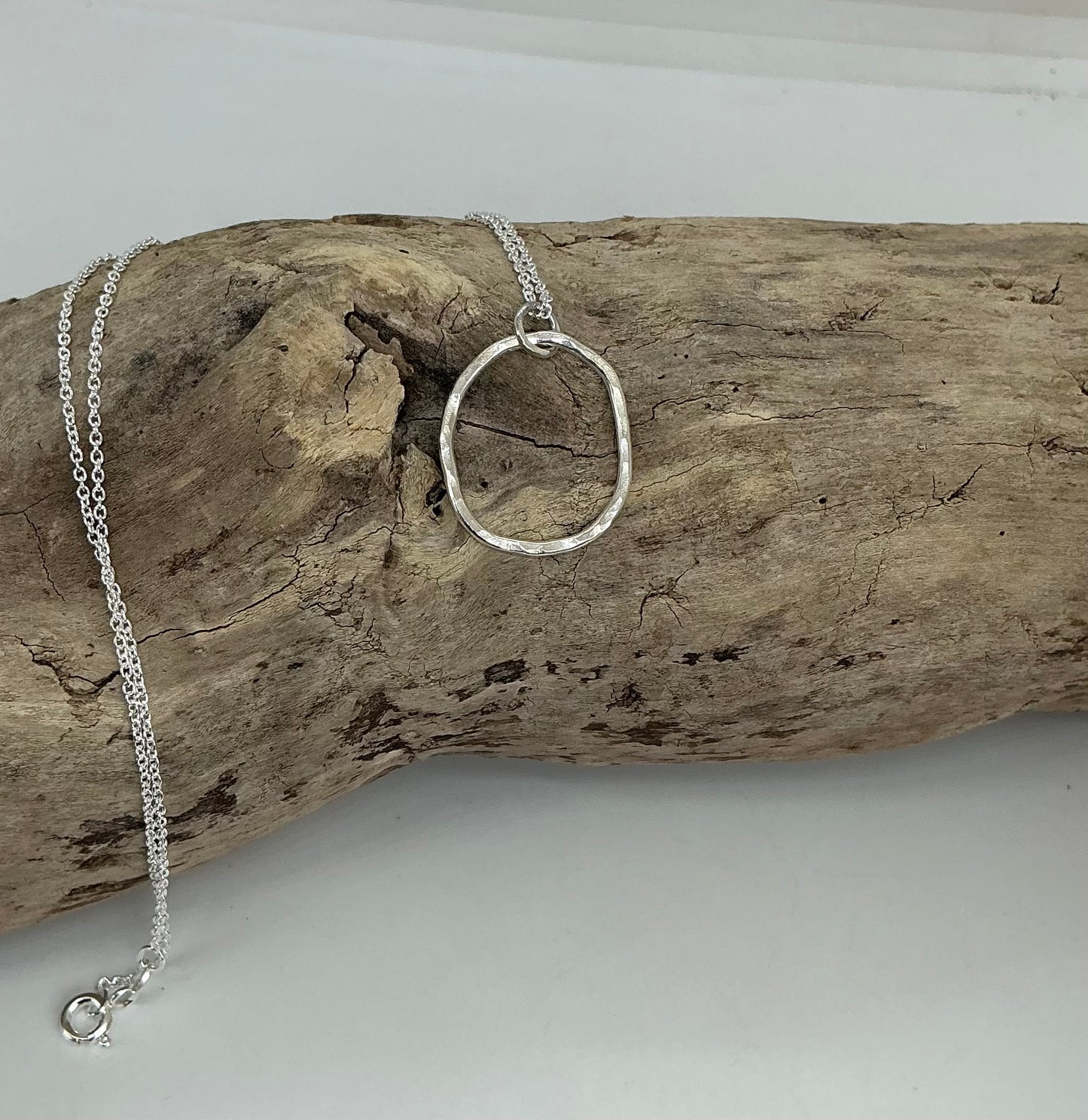 Hammered oval pendant