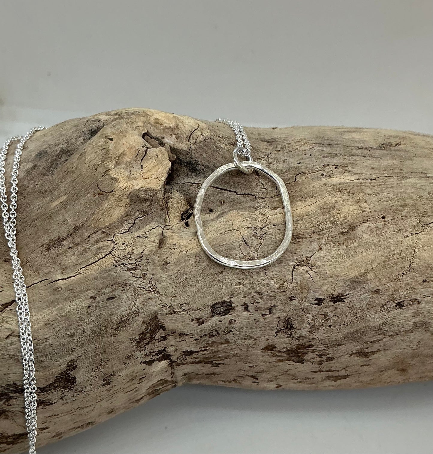 Hammered oval pendant
