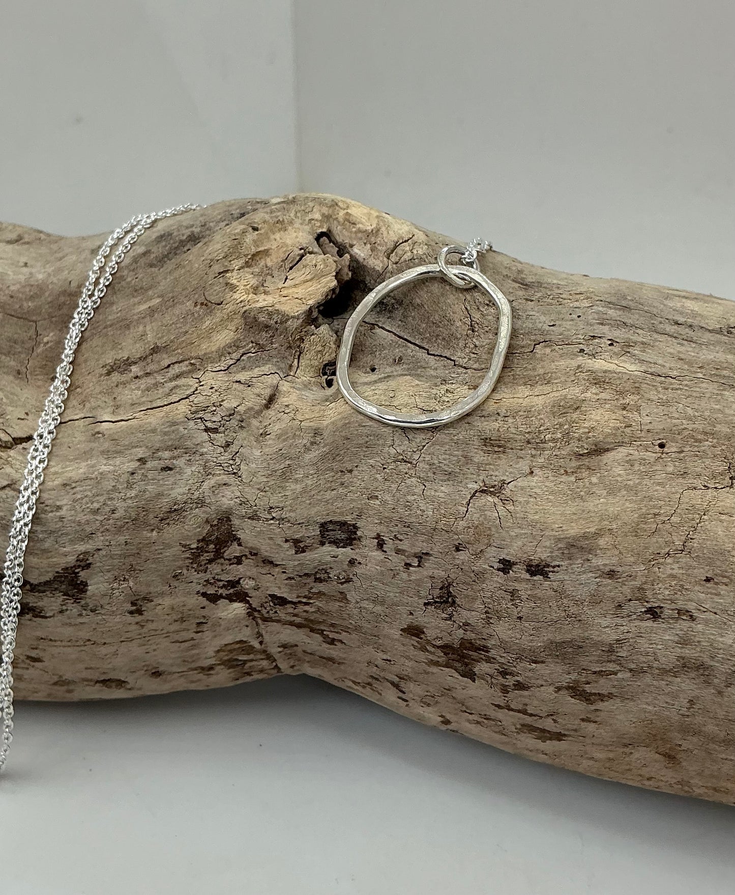 Hammered oval pendant