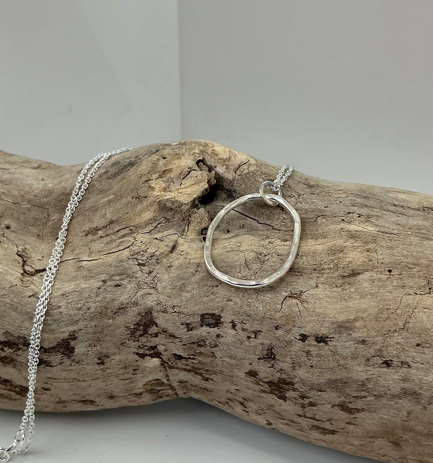 Hammered oval pendant