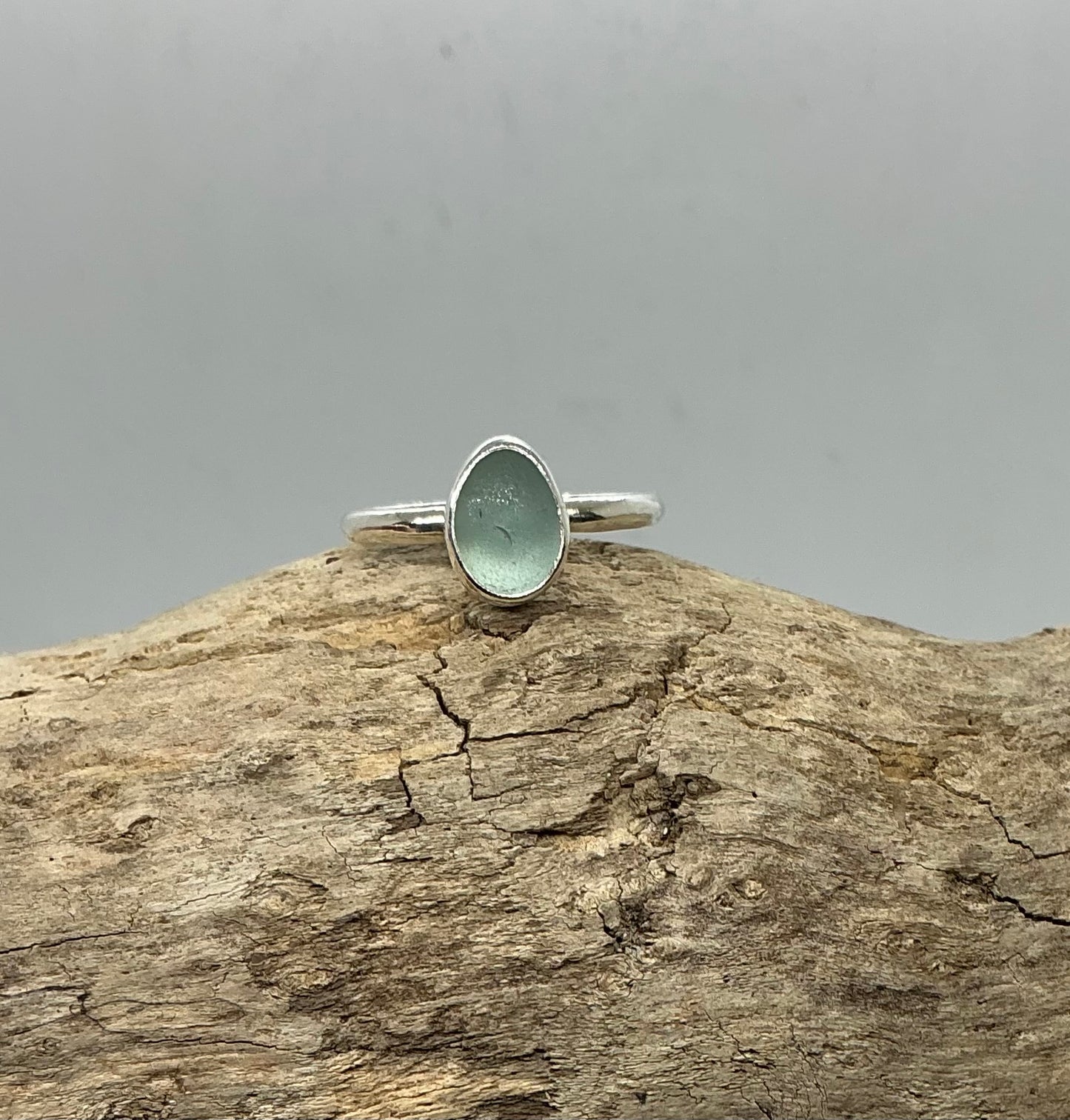 Pale green oval sea glass ring UK size T