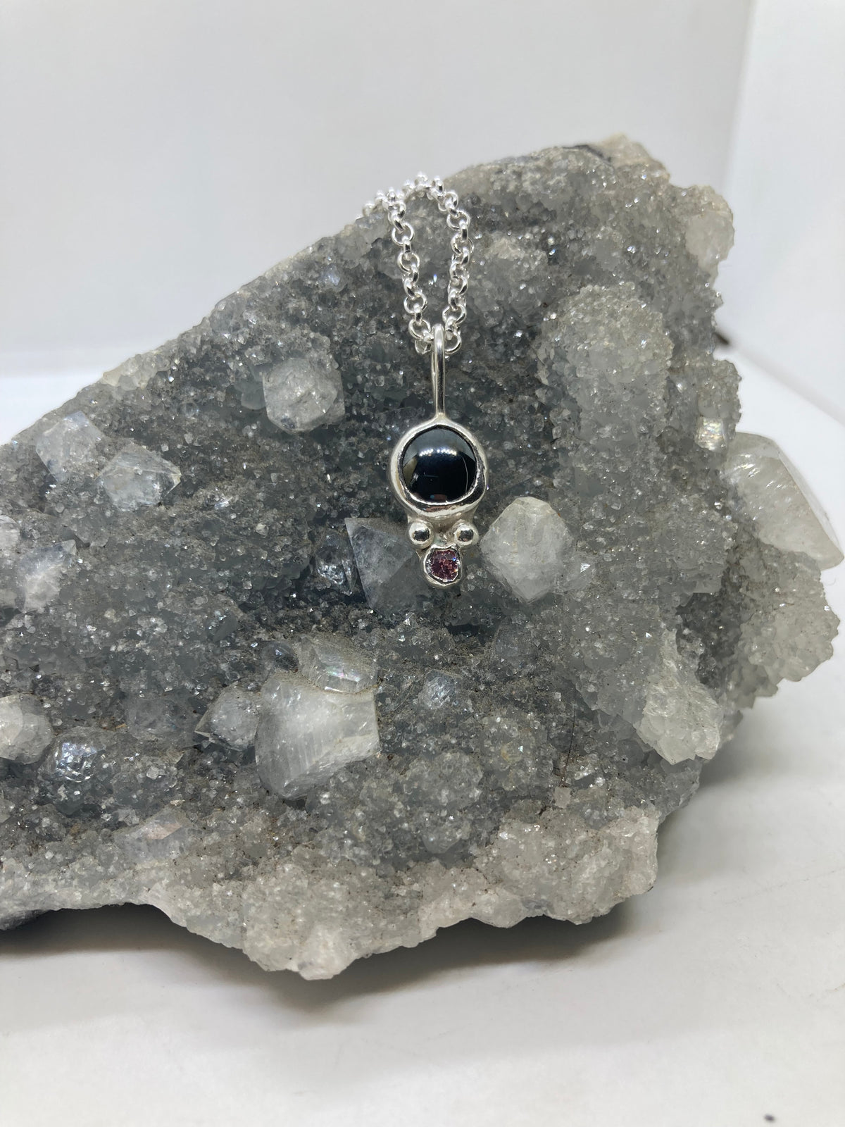 Hematite and pink CZ sterling silver pendant