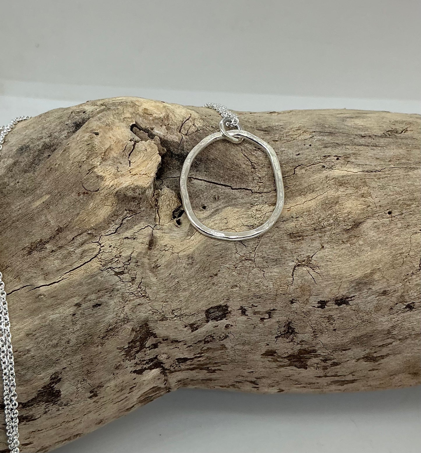 Hammered oval pendant