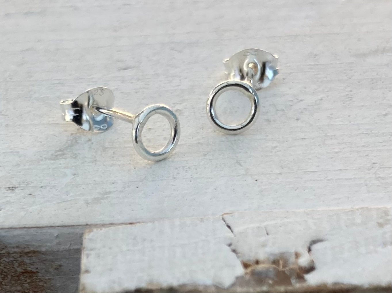 Tiny open circle stud earrings
