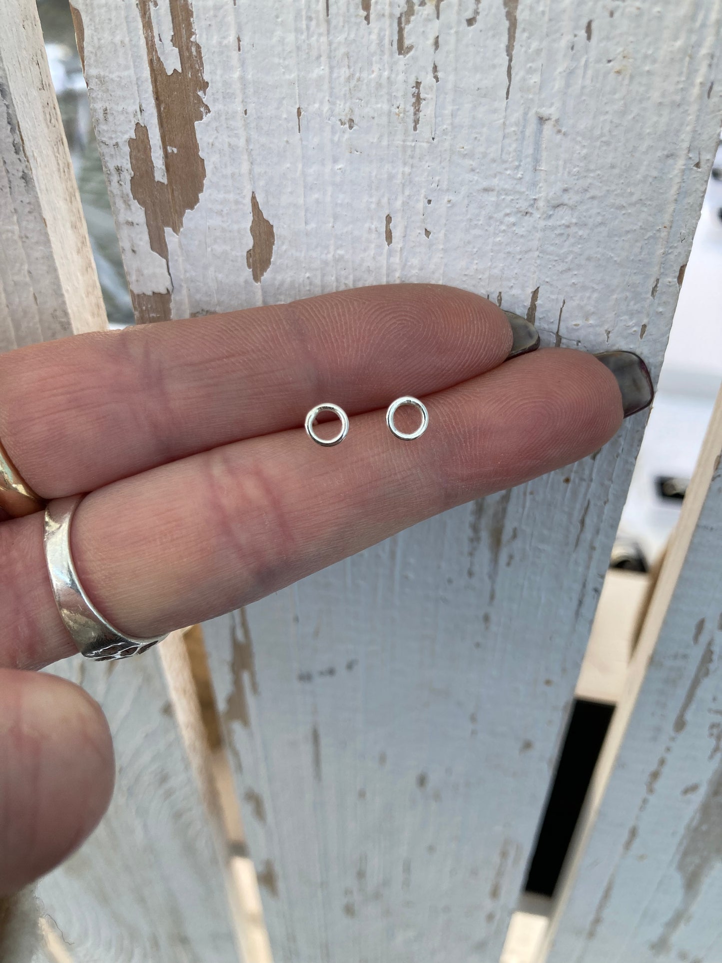 Tiny open circle stud earrings