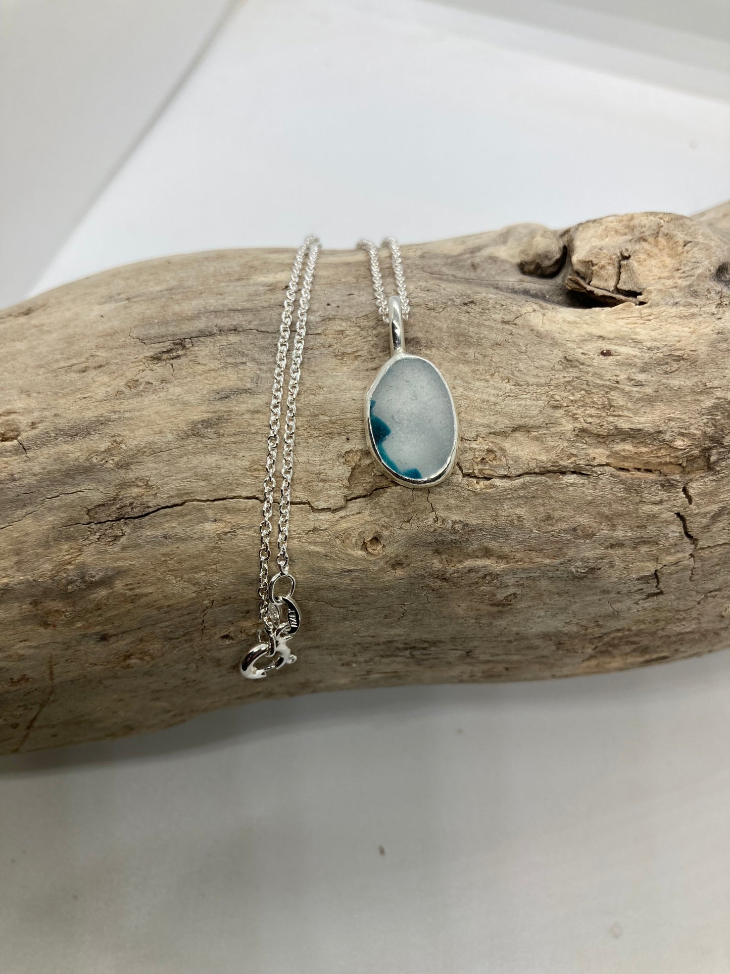 Beautiful turquoise and White Sea glass pendant