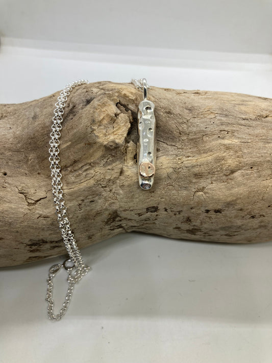 Gold and silver chunky pendant