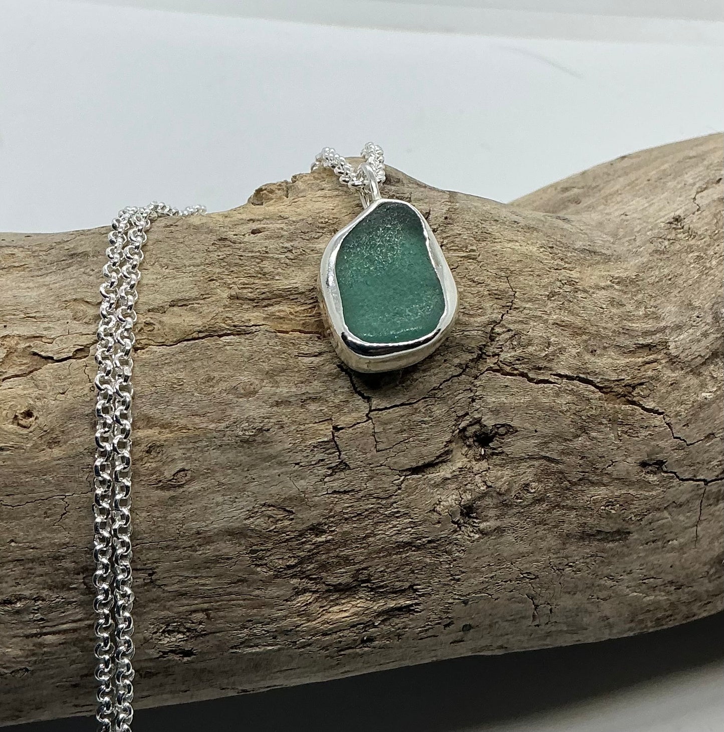 Frosted sage green indented sea glass pendant
