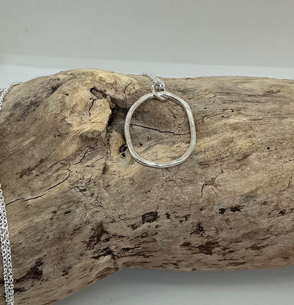 Hammered oval pendant