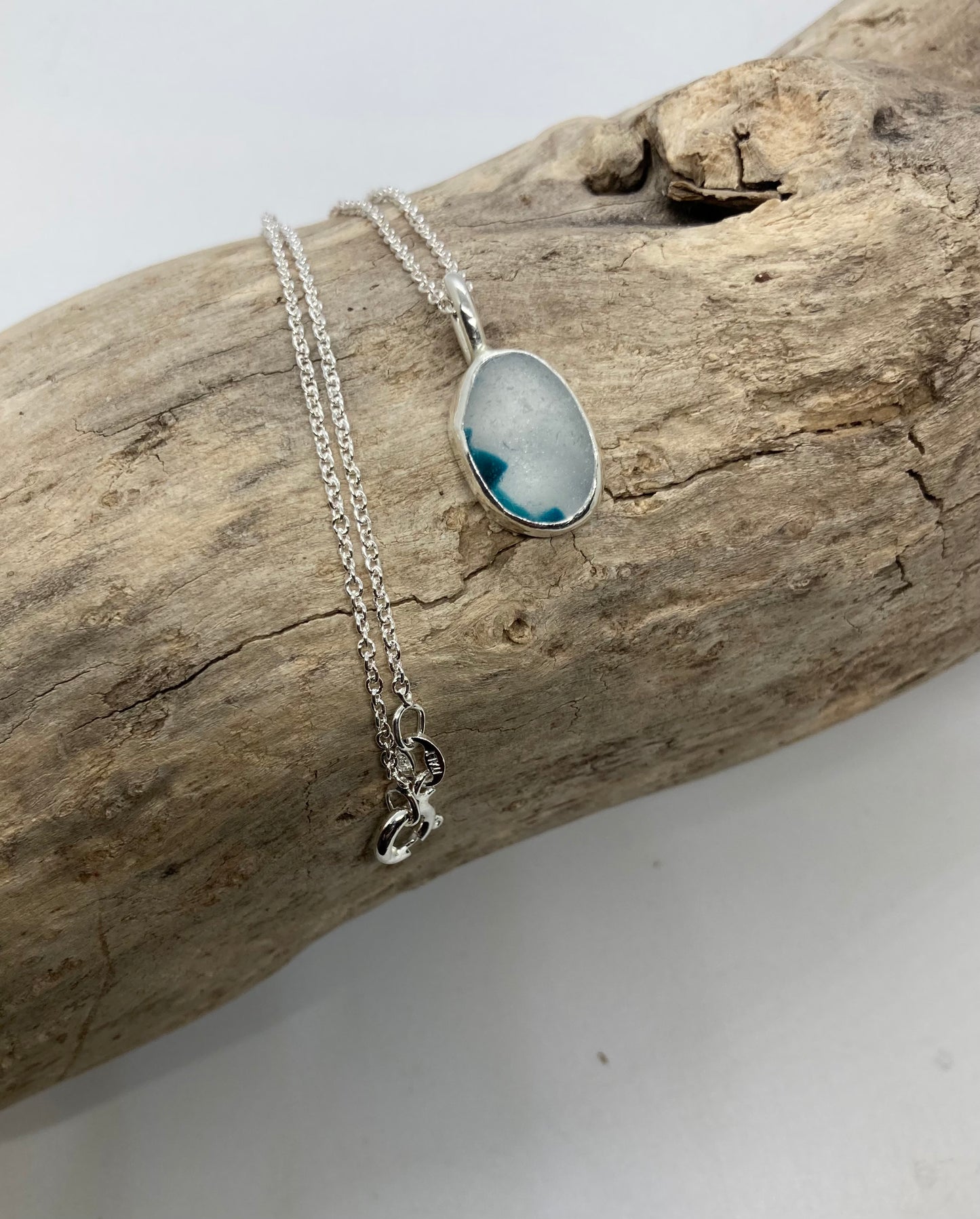Beautiful turquoise and White Sea glass pendant