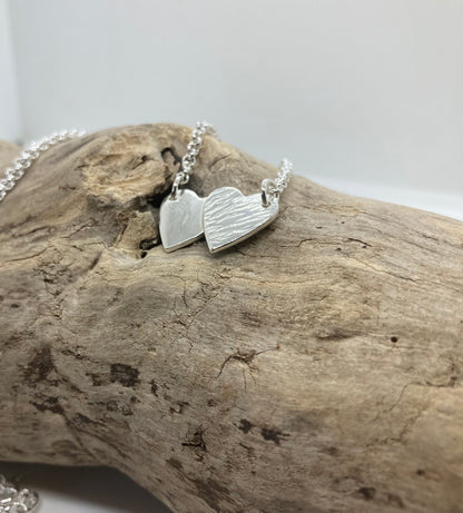 Double heart pendant