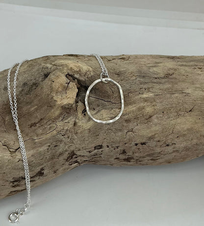Hammered oval pendant