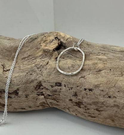 Hammered oval pendant