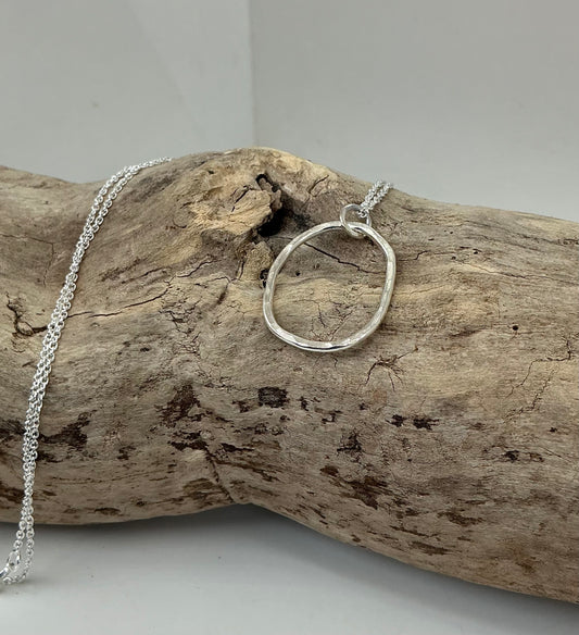 Hammered oval pendant