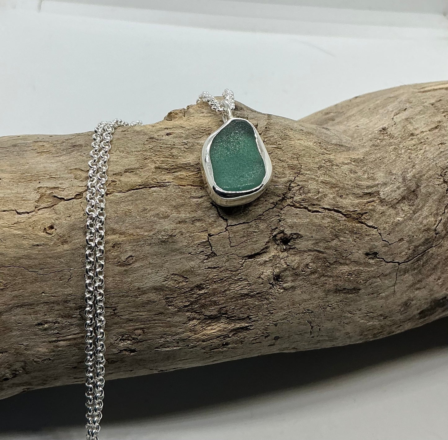Frosted sage green indented sea glass pendant