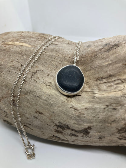 Black Seaham sea glass and sterling silver pendant