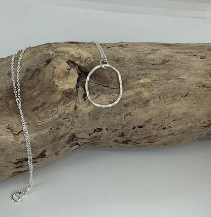 Hammered oval pendant