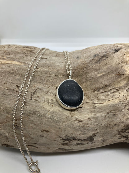 Black Seaham sea glass and sterling silver pendant