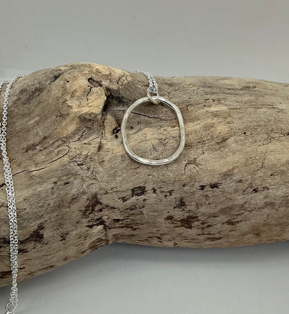 Hammered oval pendant