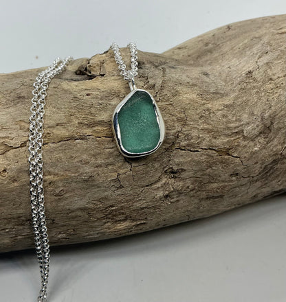 Frosted sage green indented sea glass pendant