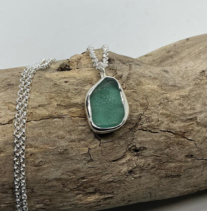 Frosted sage green indented sea glass pendant