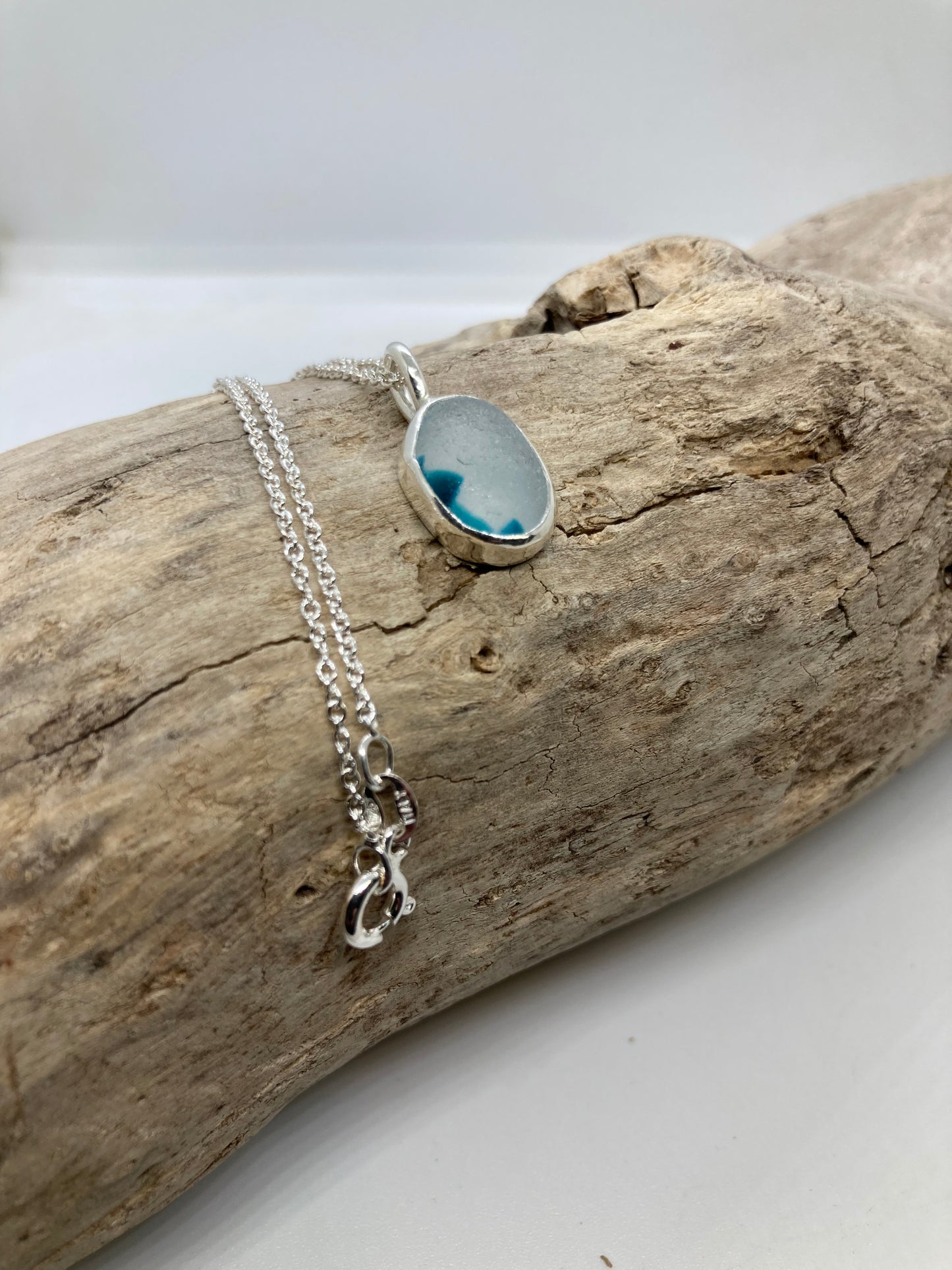 Beautiful turquoise and White Sea glass pendant