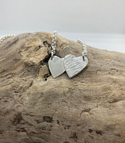 Double heart pendant