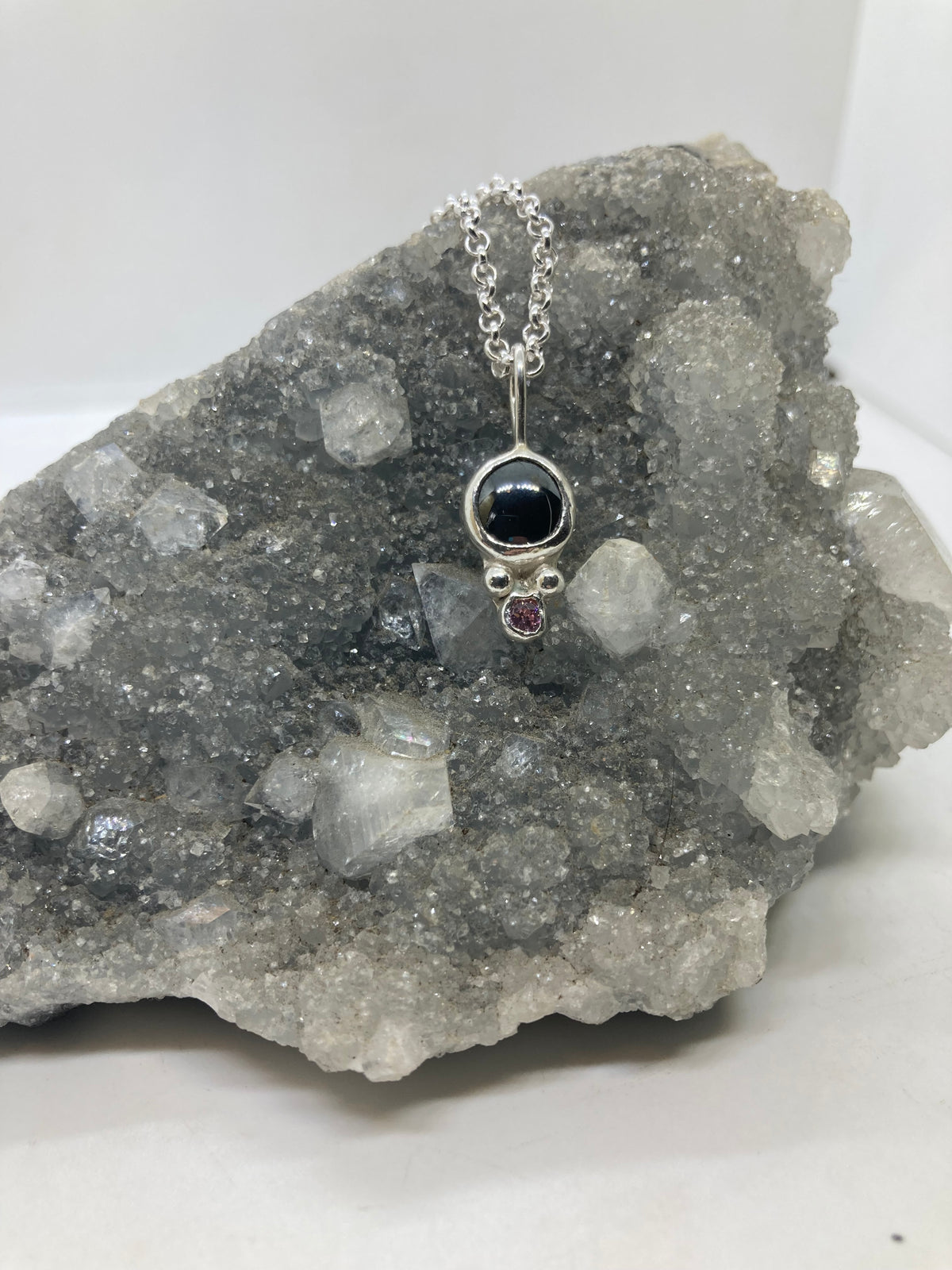 Hematite and pink CZ sterling silver pendant