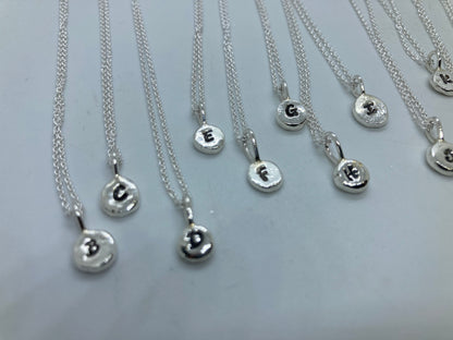 Initial pebble pendants