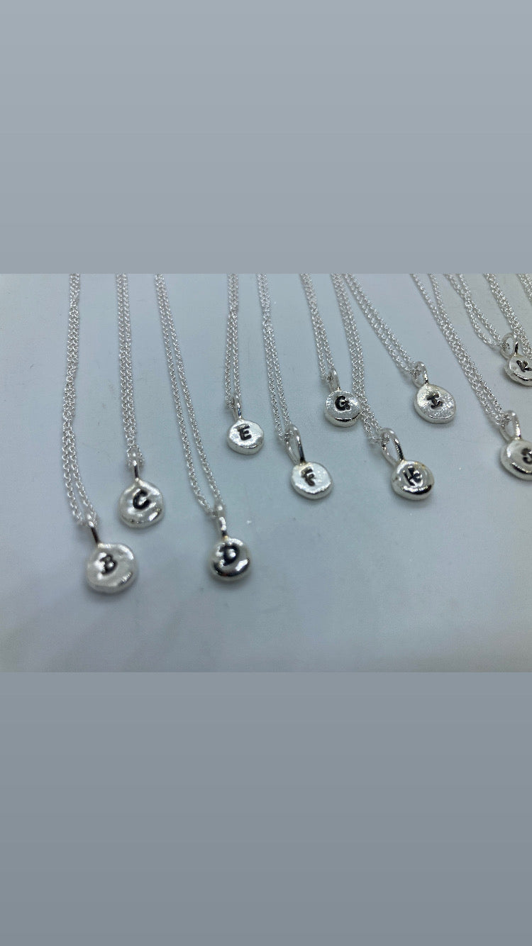 Initial pebble pendants