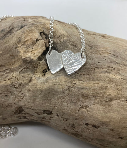 Double heart pendant