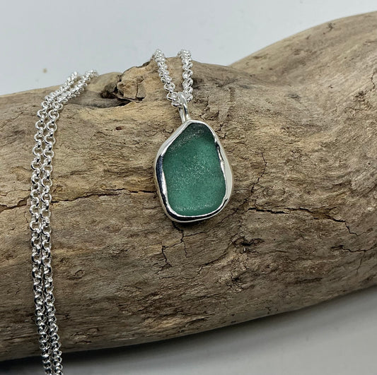 Frosted sage green indented sea glass pendant