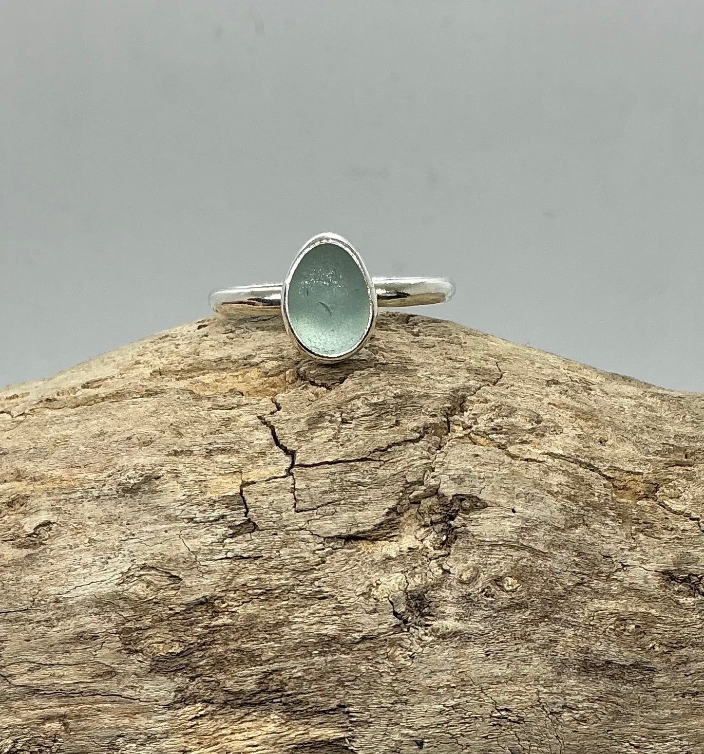 Pale green oval sea glass ring UK size T