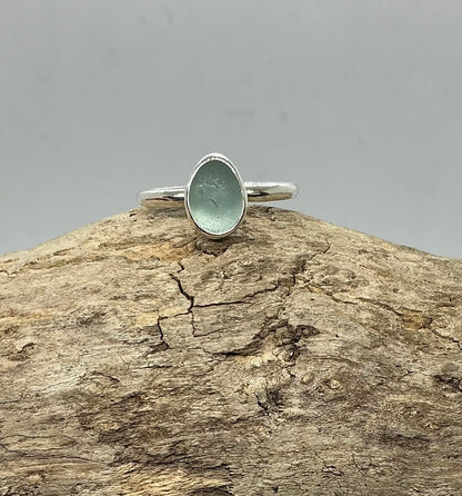 Pale green oval sea glass ring UK size T