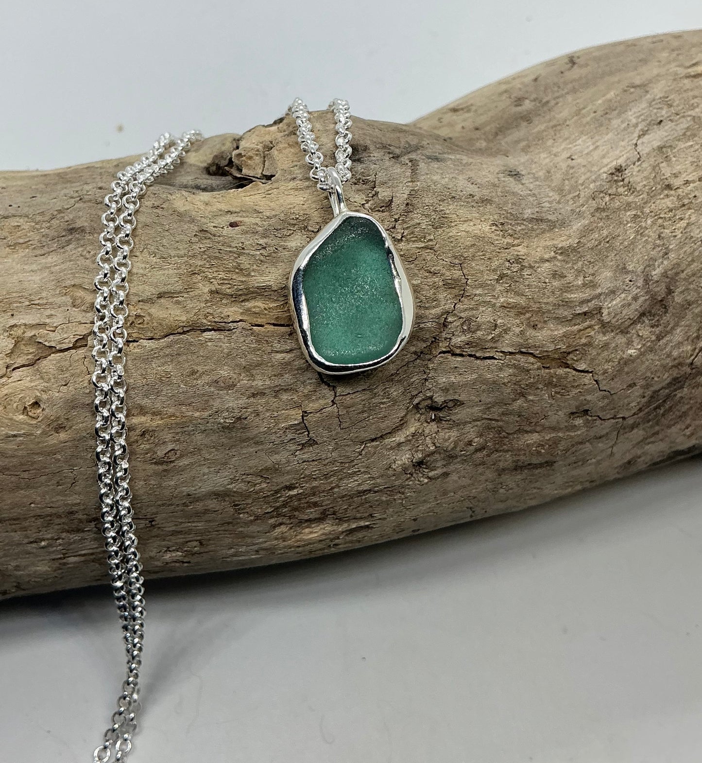 Frosted sage green indented sea glass pendant