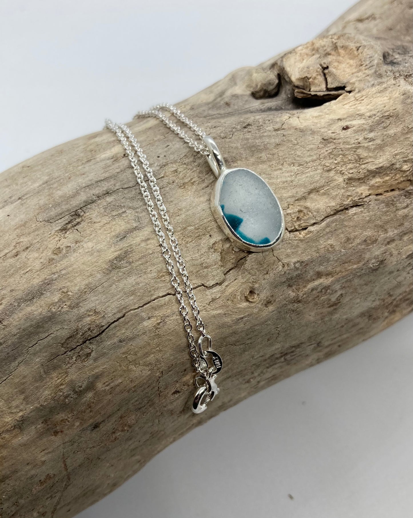 Beautiful turquoise and White Sea glass pendant