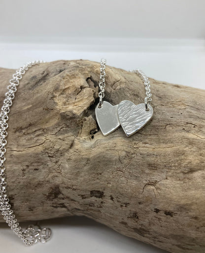 Double heart pendant