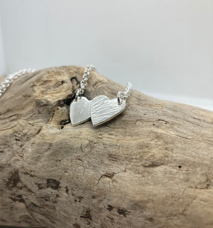 Double heart pendant