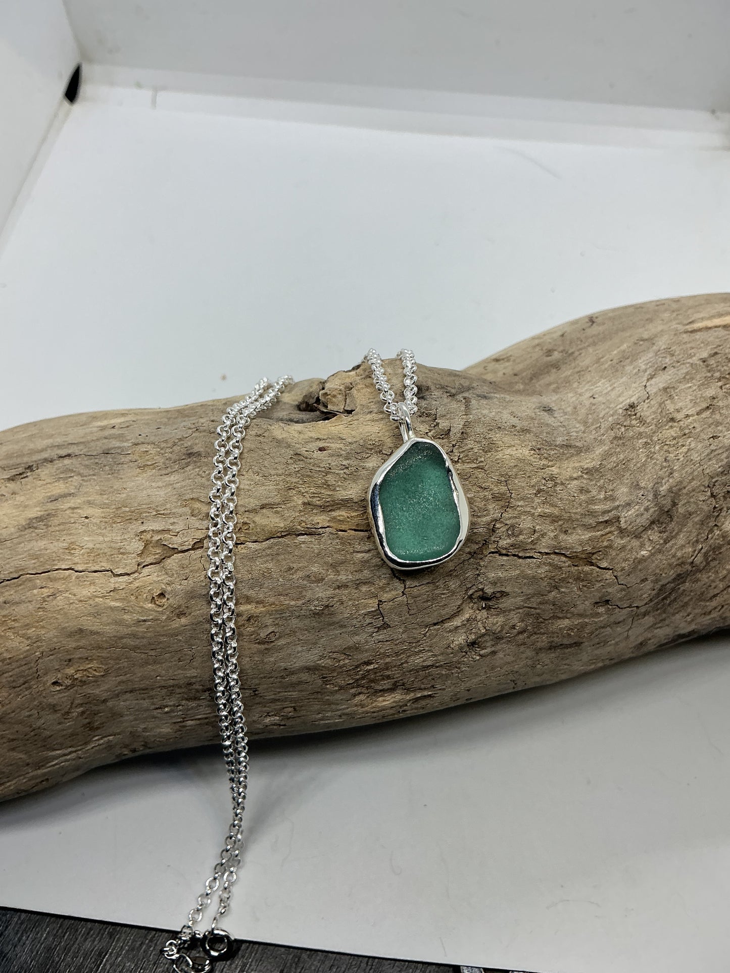 Frosted sage green indented sea glass pendant