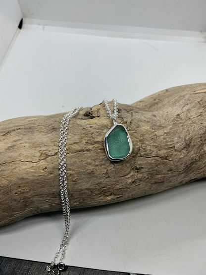 Frosted sage green indented sea glass pendant