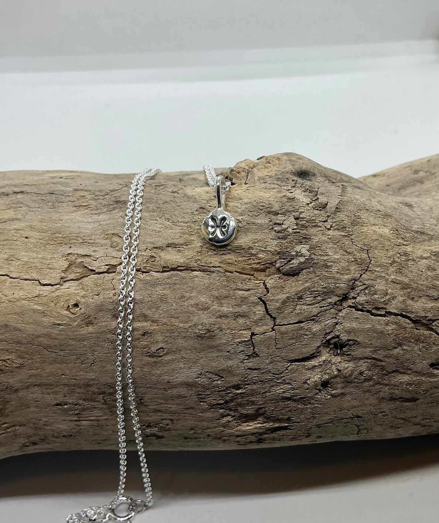 Star sign silver pebble pendants