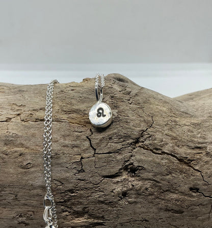 Star sign silver pebble pendants