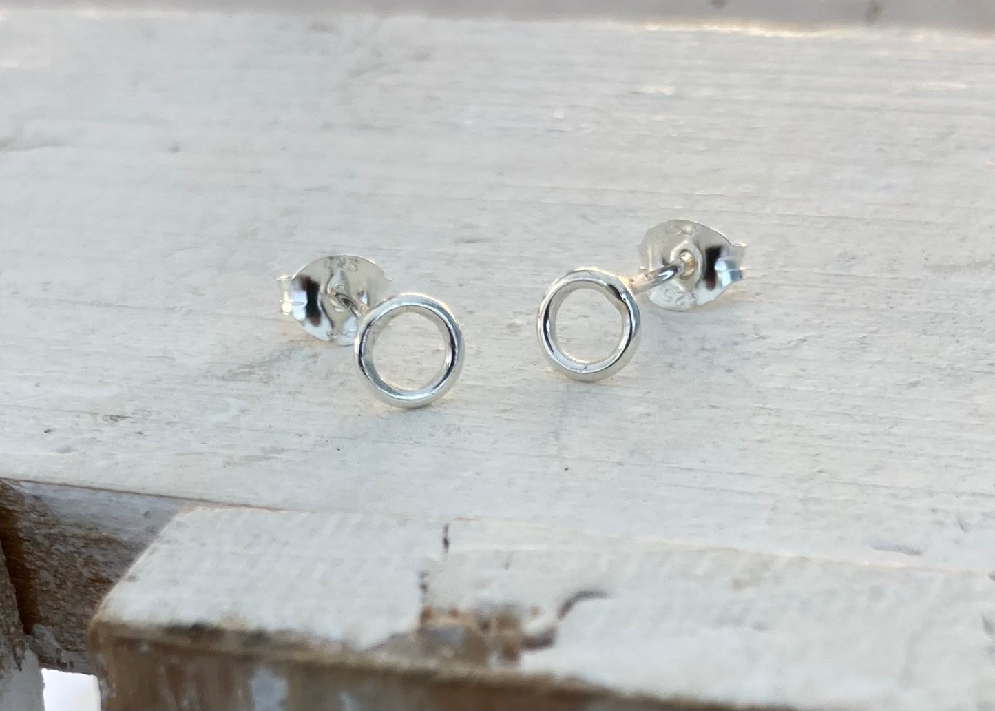 Tiny open circle stud earrings
